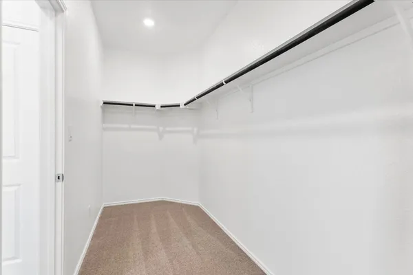 a bathroom with a sink and a large mirror