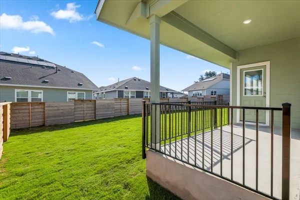 a view of a backyard with a garden