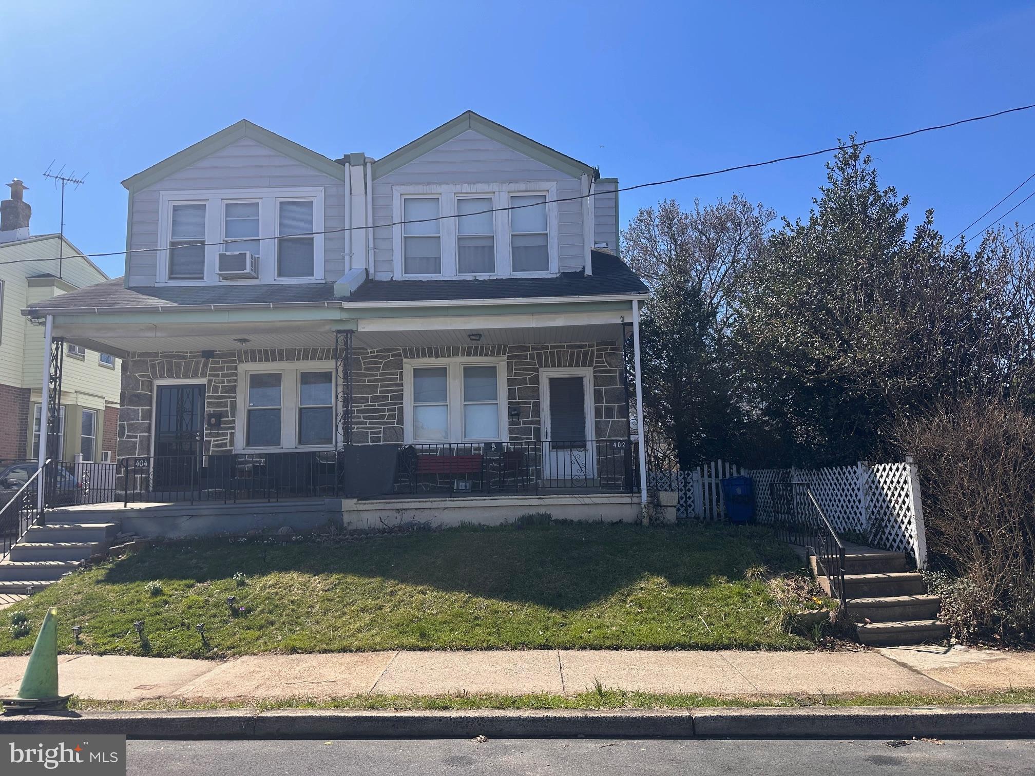 402 Walter Street Philadelphia, PA 19111 - Photo 1 of 15 front view of a house with a yard