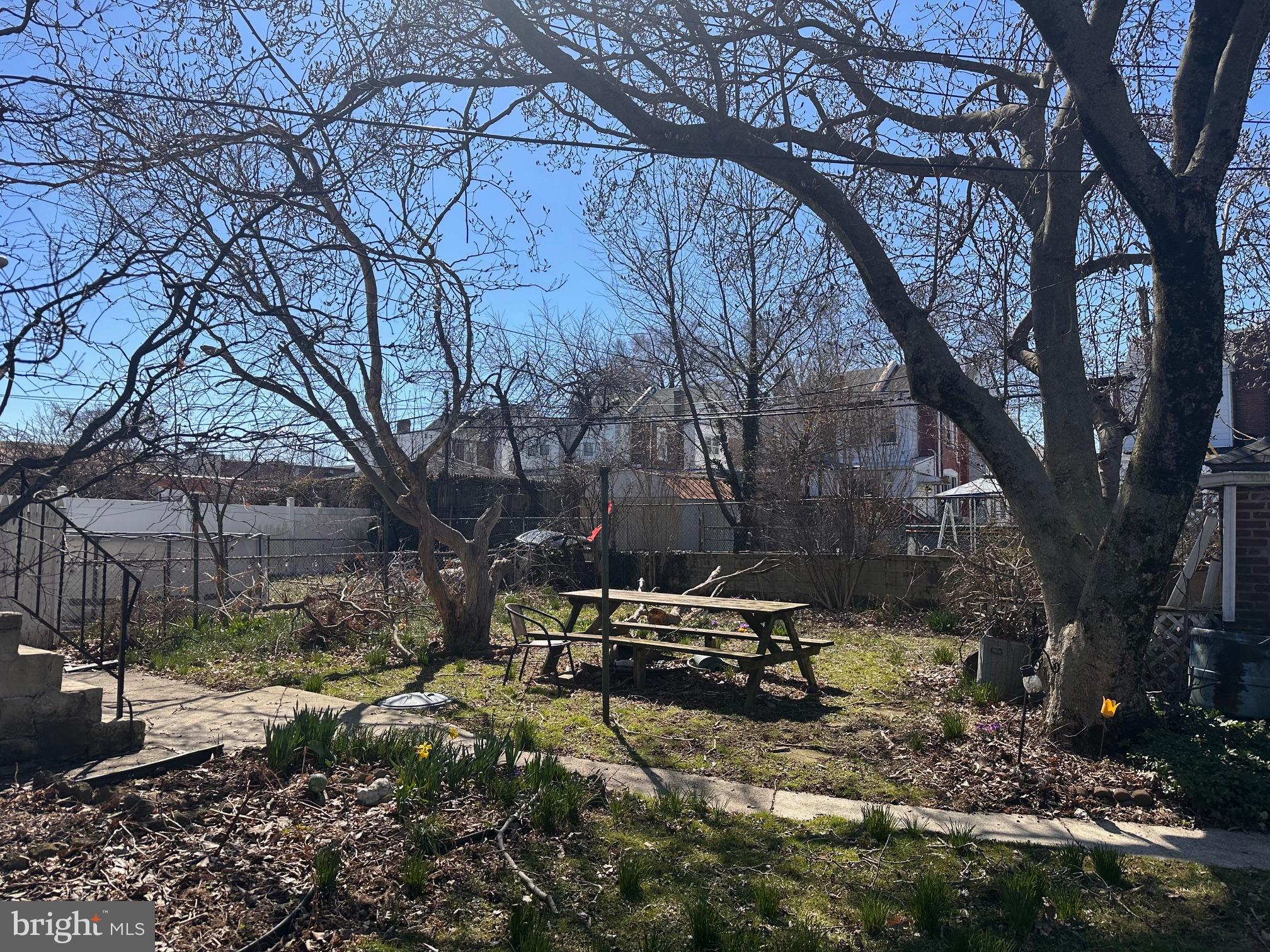 402 Walter Street Philadelphia, PA 19111 - Photo 14 of 15 a bench is sitting in middle of forest