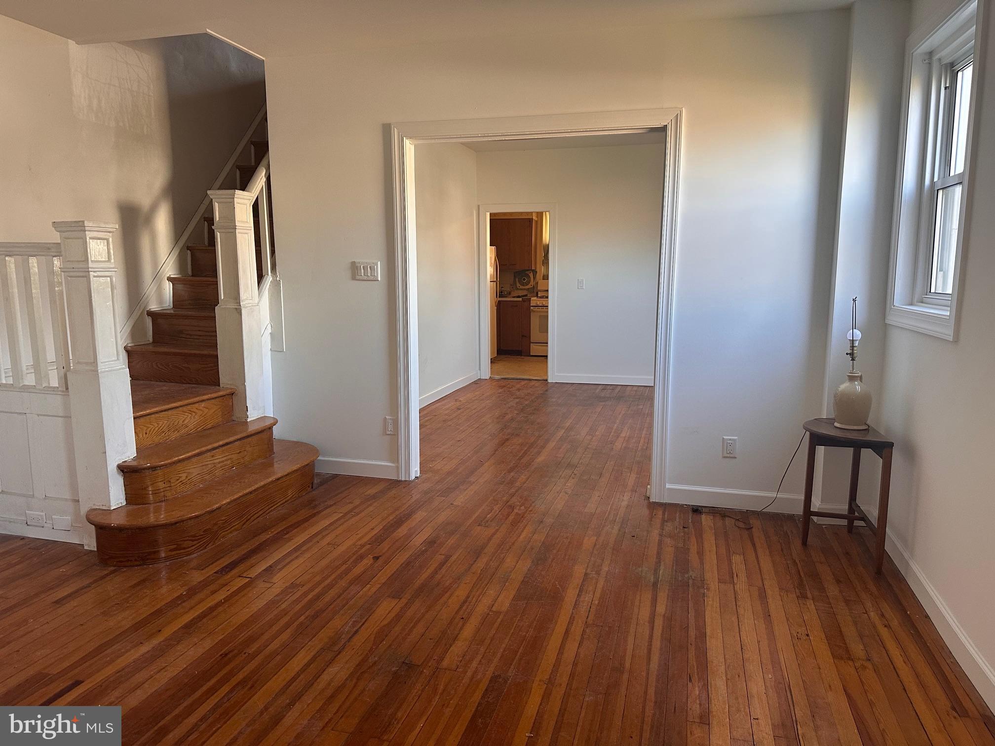 402 Walter Street Philadelphia, PA 19111 - Photo 2 of 15 a view of a room with wooden floor and stairs