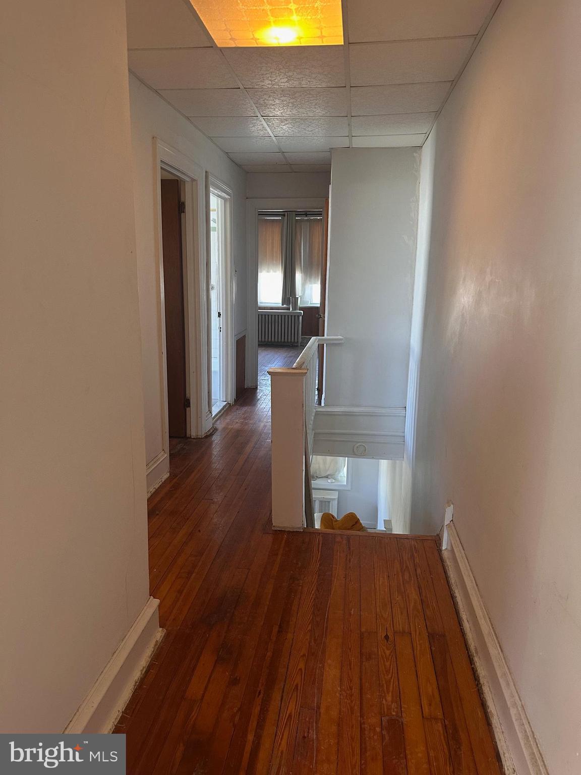 402 Walter Street Philadelphia, PA 19111 - Photo 7 of 15 a view of a room with wooden floor and staircase
