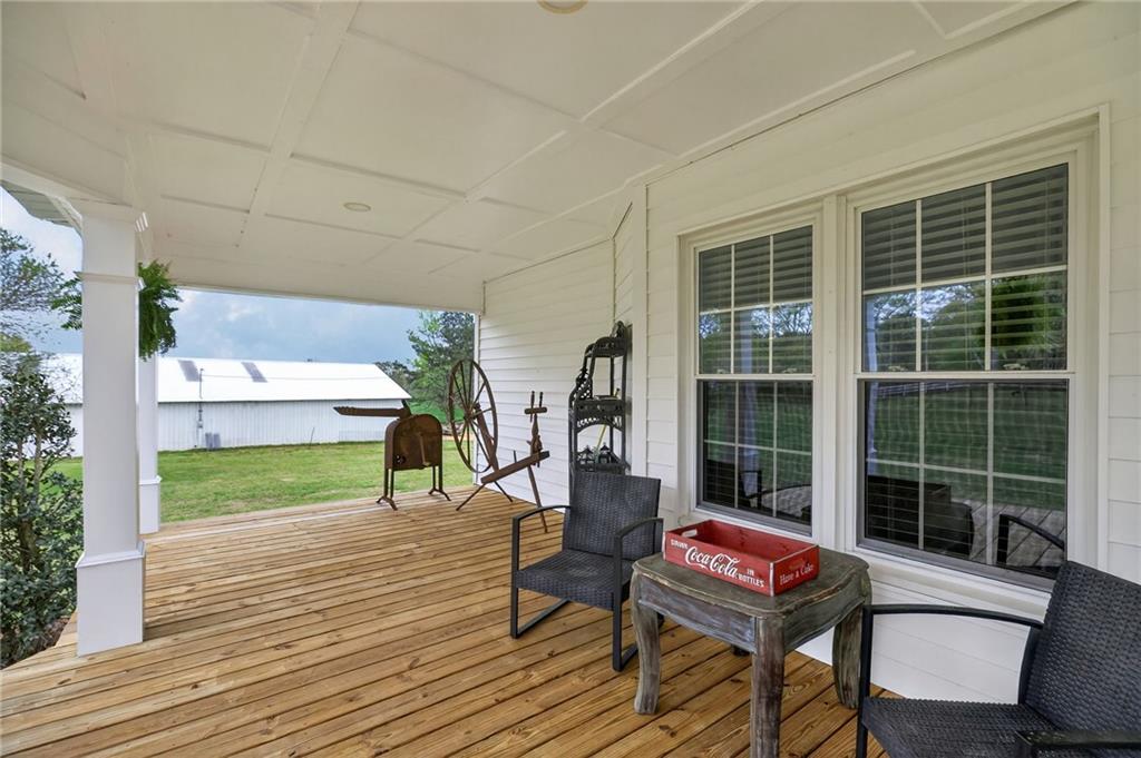 3590 Roosterville Road Roopville, GA 30170 - Photo 14 of 66 a house view with a sitting space and garden