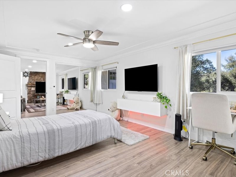 10201 River Drive Descanso, CA 91916 - Photo 24 of 42 a bedroom with a bed and a flat screen tv