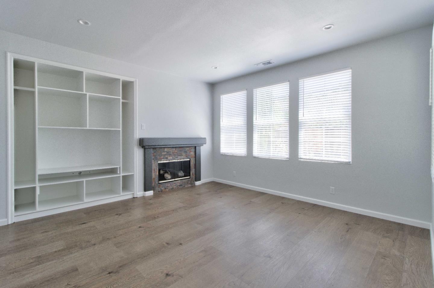 2715 Shellgate Circle Hayward, CA 94545 - Photo 14 of 47 a view of an empty room with a window and fireplace