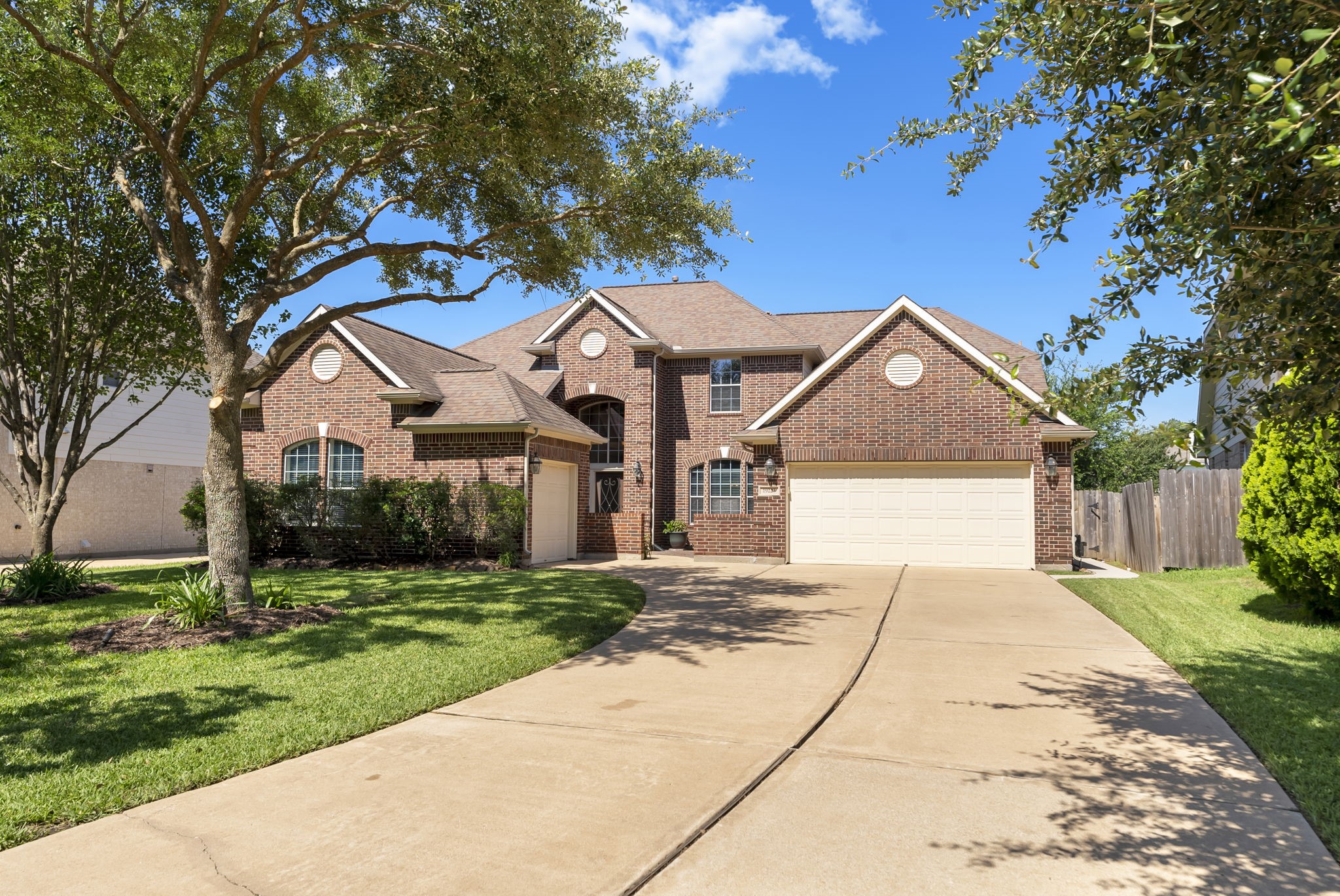 19223 Senterra Lakes Boulevard Spring, TX 77379 - Photo 3 of 48 a front view of a house with a yard and garage