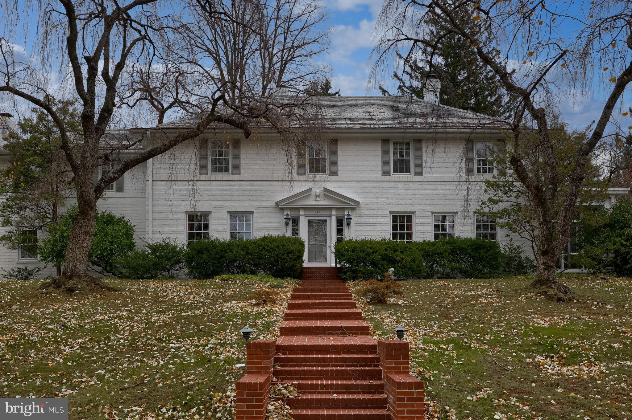 226 East Caracas Avenue Hershey, PA 17033 - Photo 1 of 67 a front view of a house with a yard