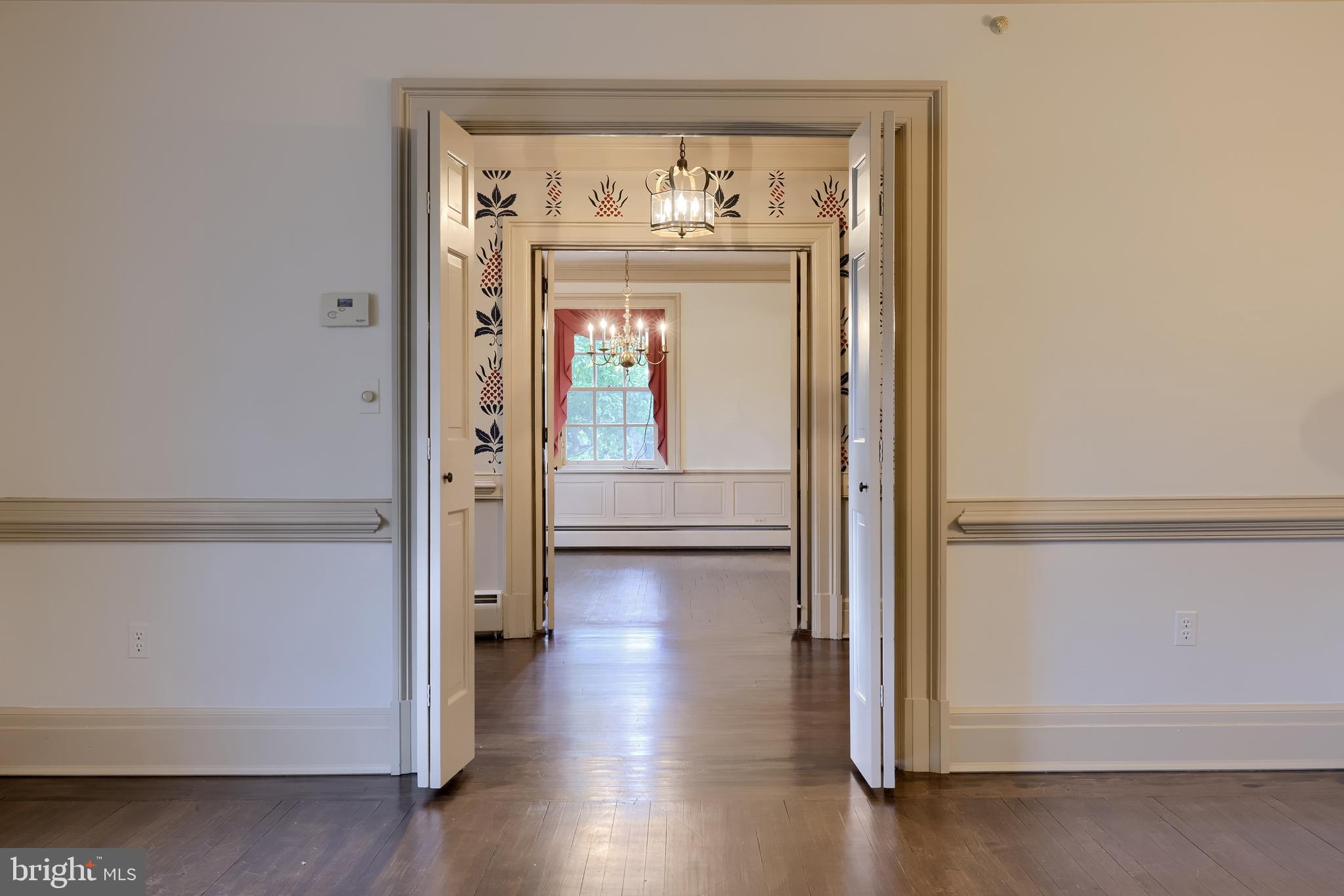 226 East Caracas Avenue Hershey, PA 17033 - Photo 13 of 67 a view of a hallway with wooden floor