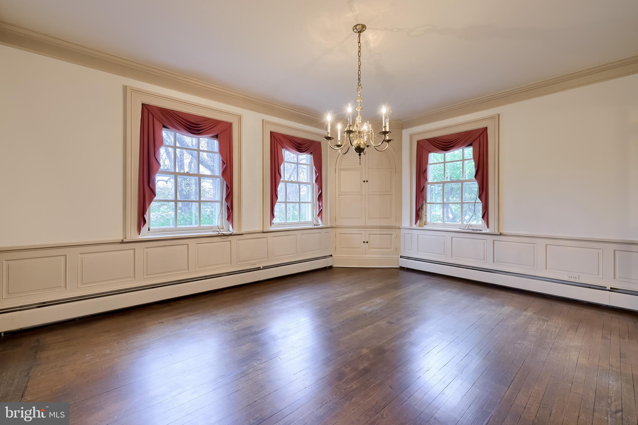 226 East Caracas Avenue Hershey, PA 17033 - Photo 14 of 67 a view of an empty room with wooden floor and a window