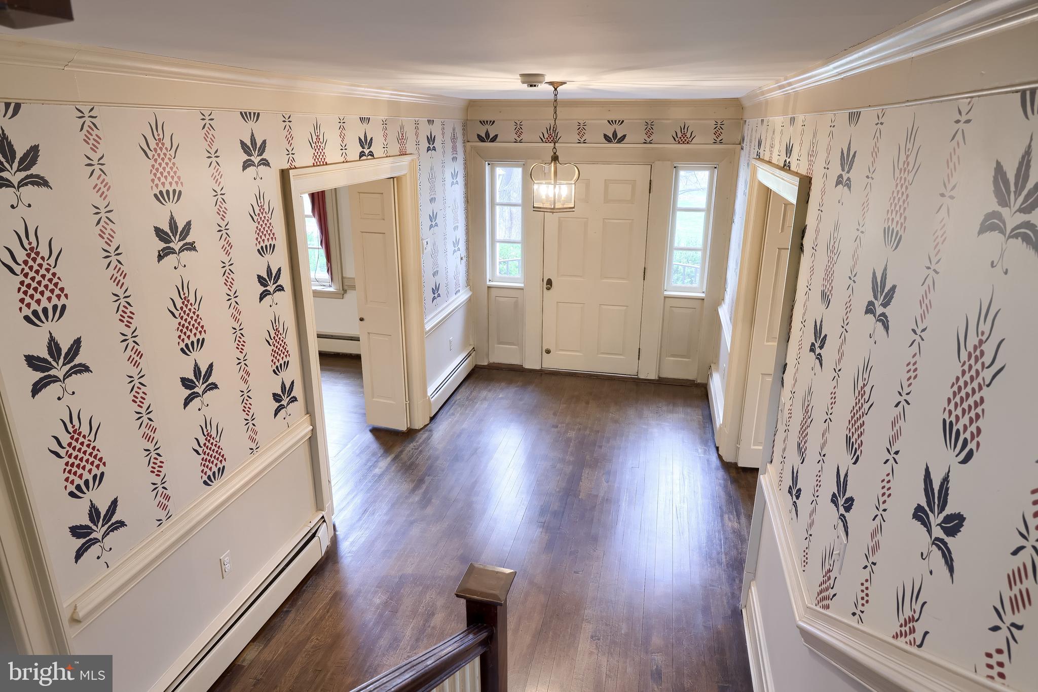 226 East Caracas Avenue Hershey, PA 17033 - Photo 35 of 67 a view of entryway with wooden floor and stairs
