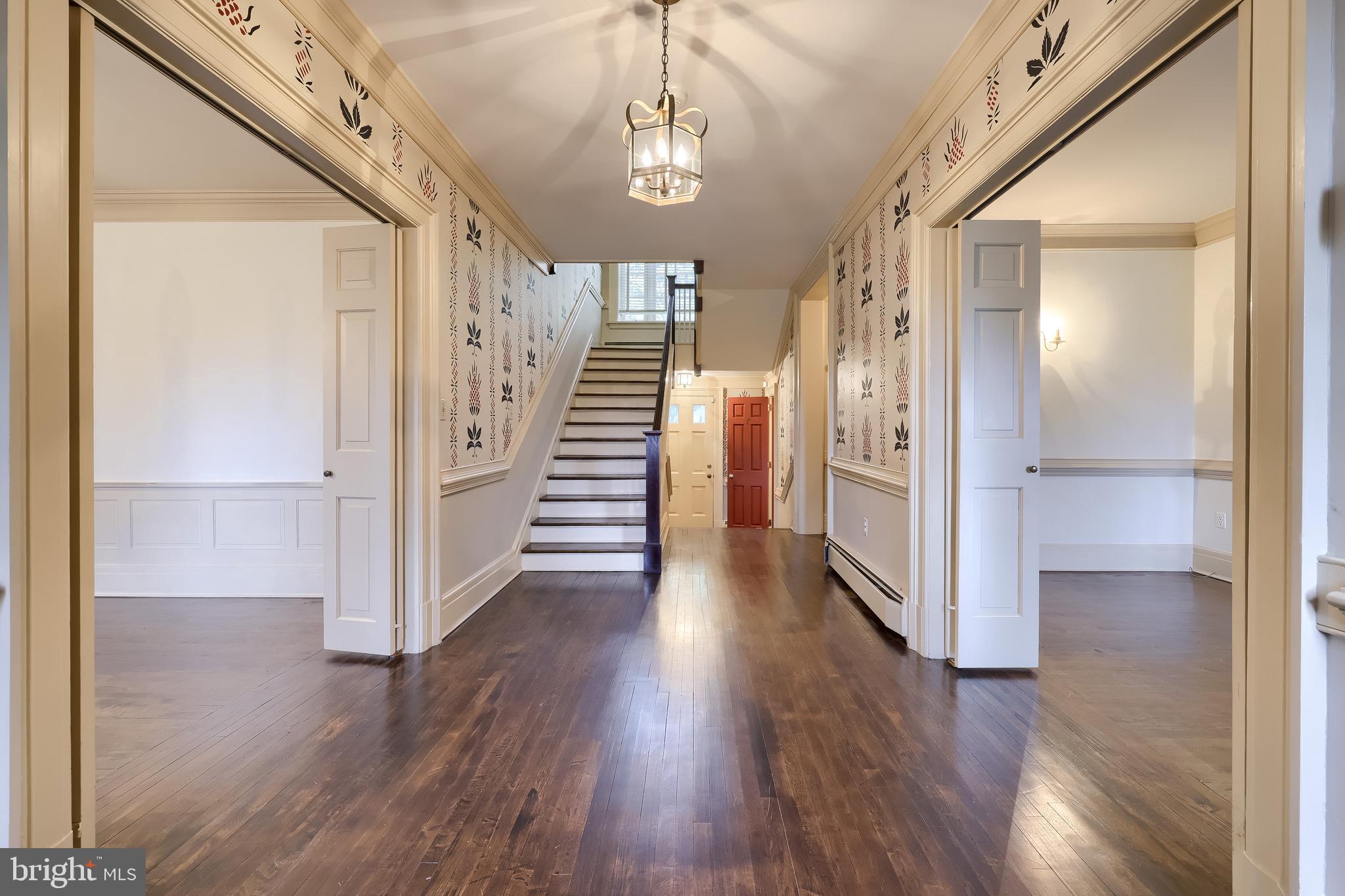226 East Caracas Avenue Hershey, PA 17033 - Photo 4 of 67 a view of a hallway with wooden floor