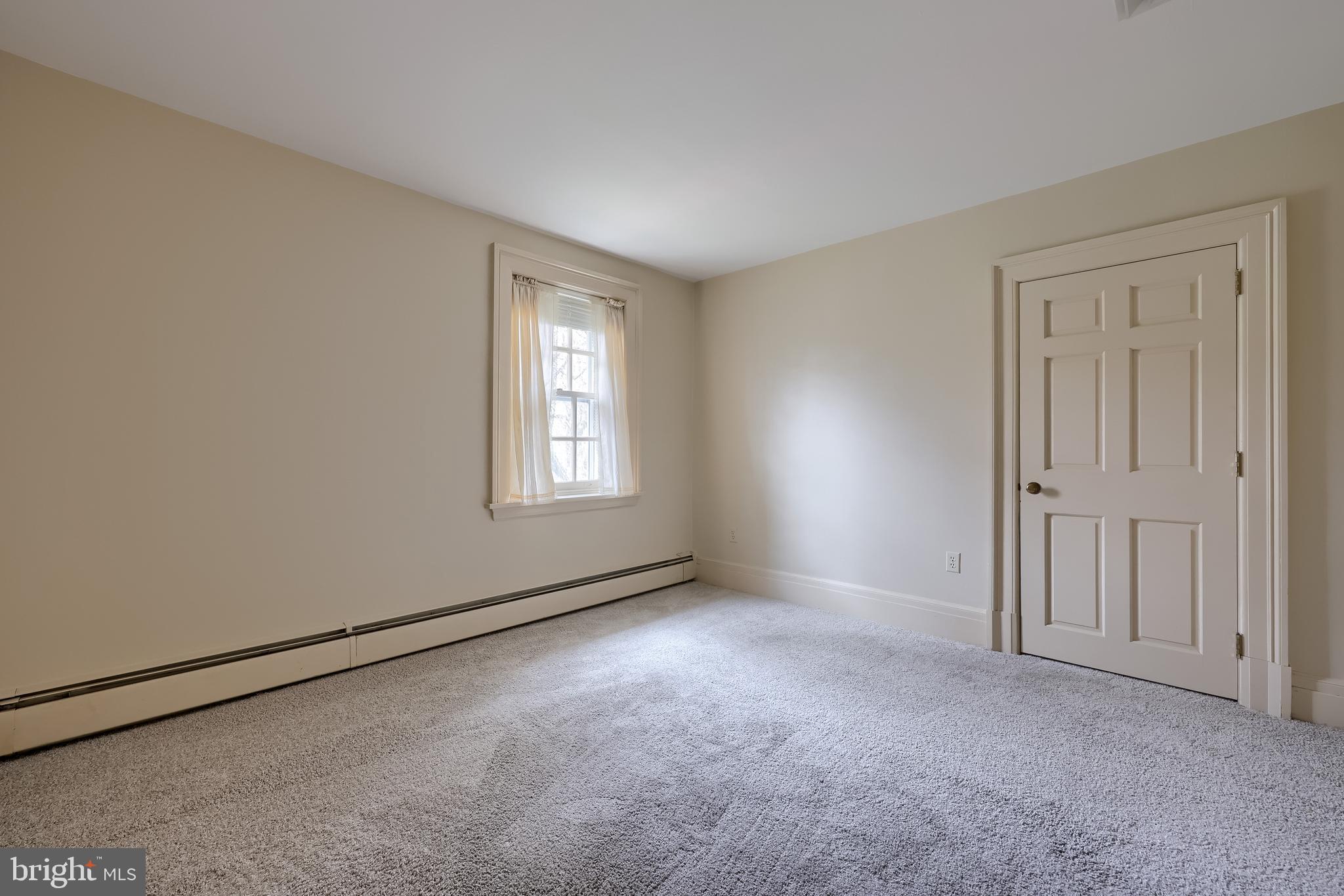 226 East Caracas Avenue Hershey, PA 17033 - Photo 41 of 67 a view of an empty room with a window