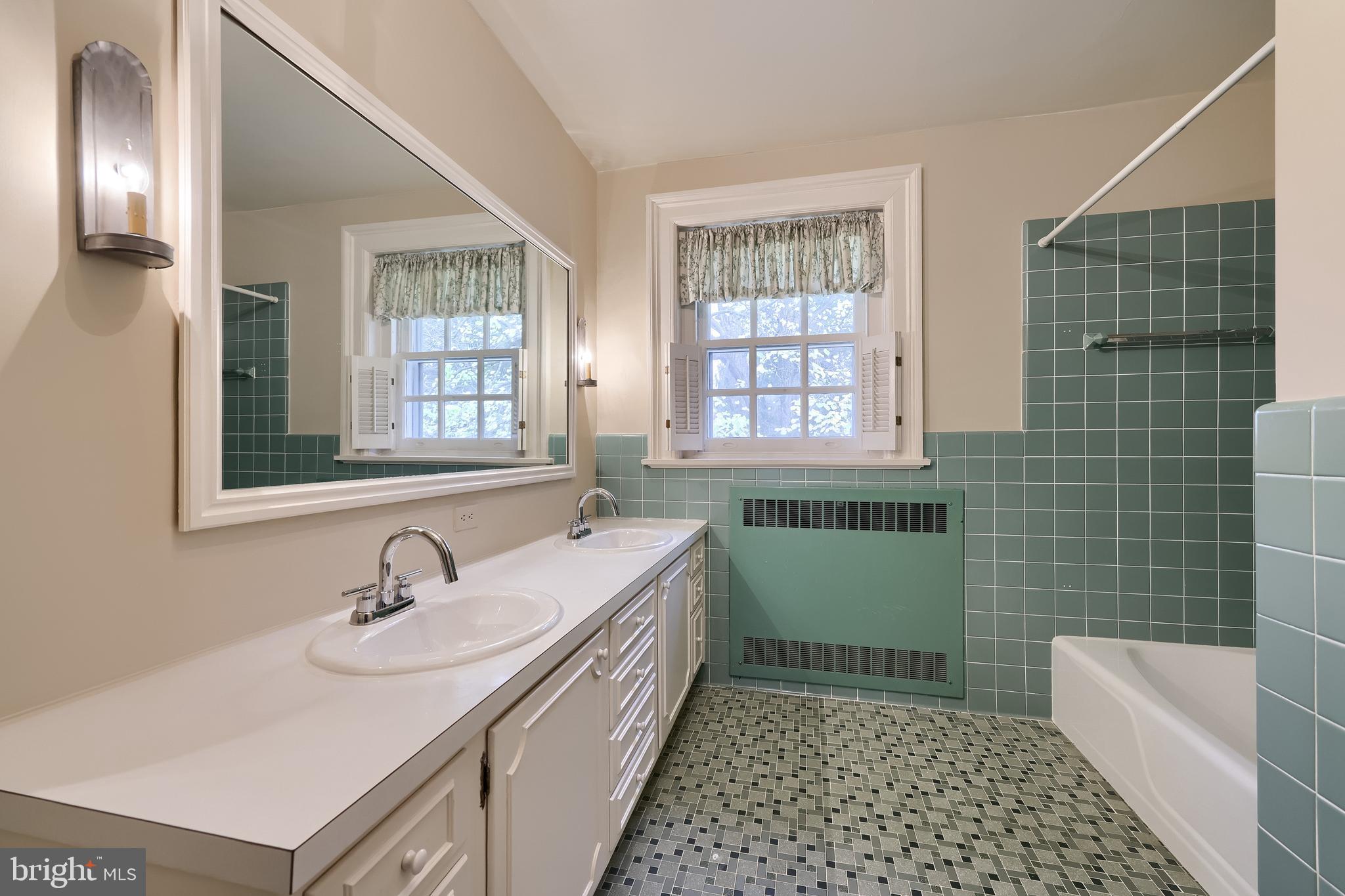 226 East Caracas Avenue Hershey, PA 17033 - Photo 43 of 67 a bathroom with a sink a toilet and window