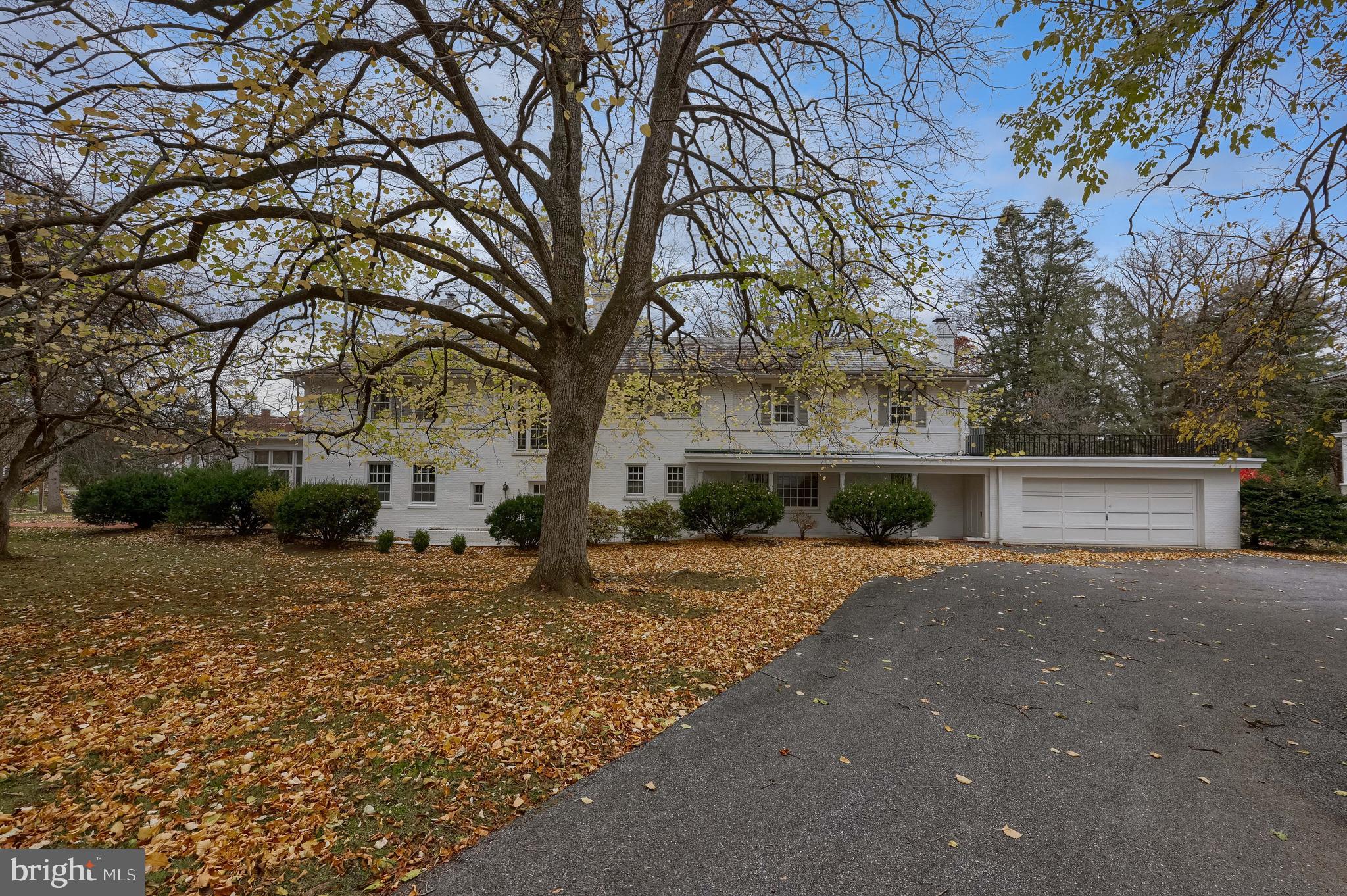 226 East Caracas Avenue Hershey, PA 17033 - Photo 58 of 67 a front view of a house with yard and trees