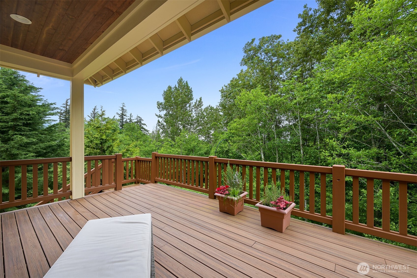 1910 40th Street Bellingham, WA 98229 - Photo 32 of 40 a view of balcony with couch and wooden floor