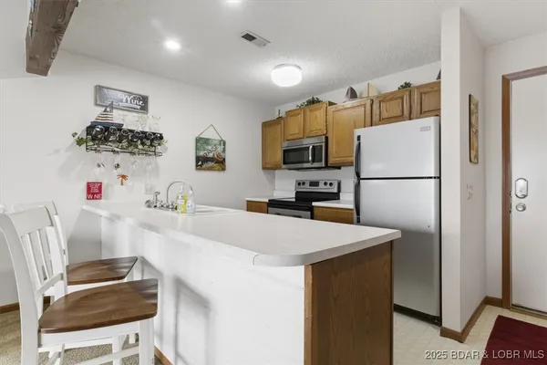 $234,500 | 70 Robinwood Drive, Unit 3E, Lake Ozark, MO 65049