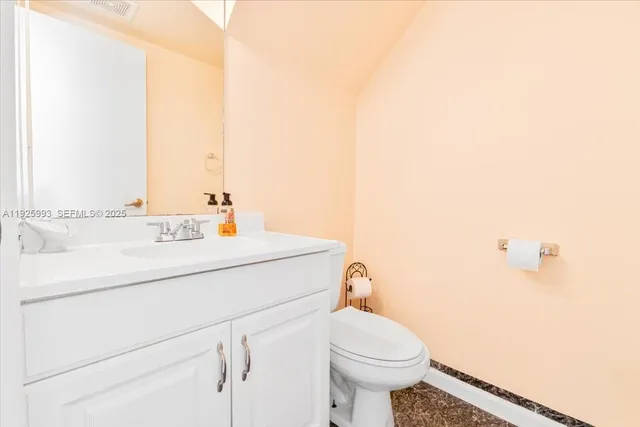 a bathroom with a sink and a toilet