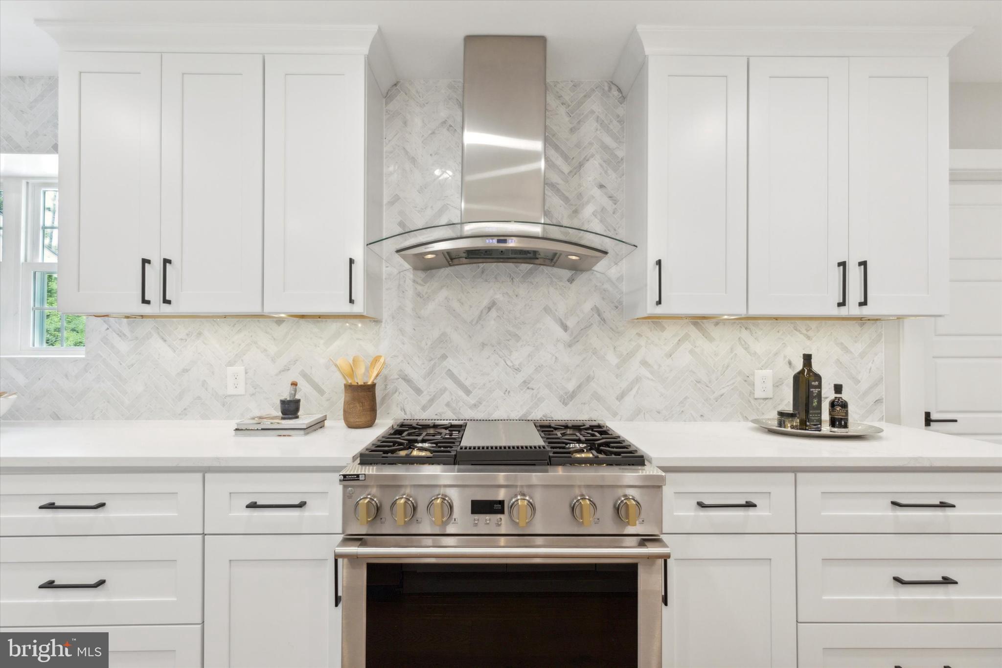 607 Golf Club Road Newtown Square, PA 19073 - Photo 20 of 86 a stove top oven sitting inside of a kitchen
