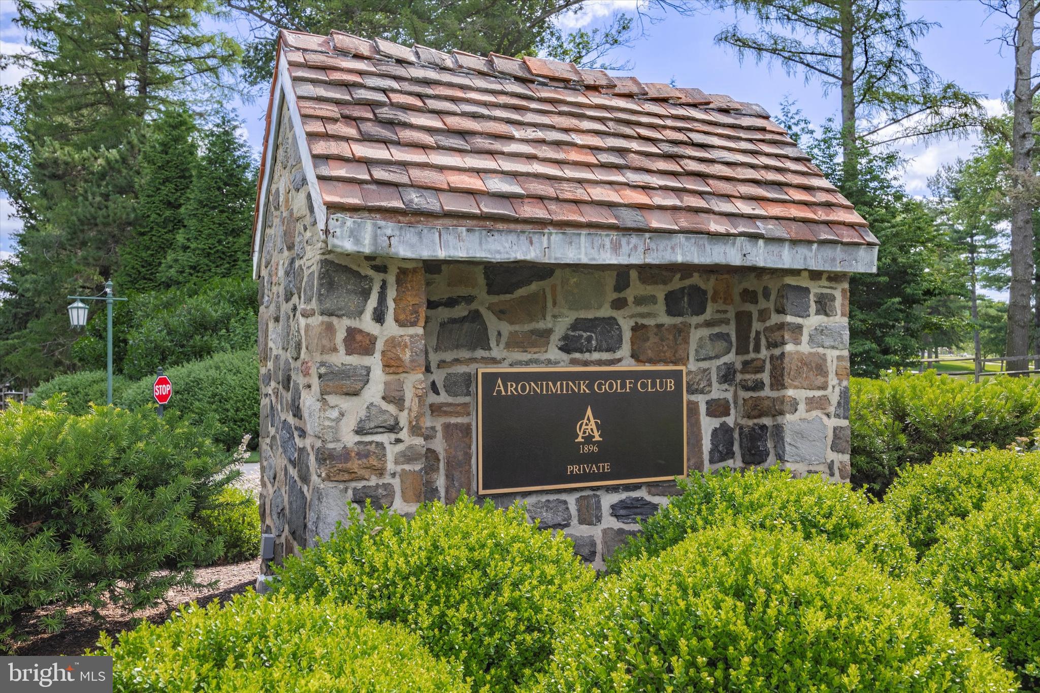 607 Golf Club Road Newtown Square, PA 19073 - Photo 4 of 86 a front view of a house with a garden