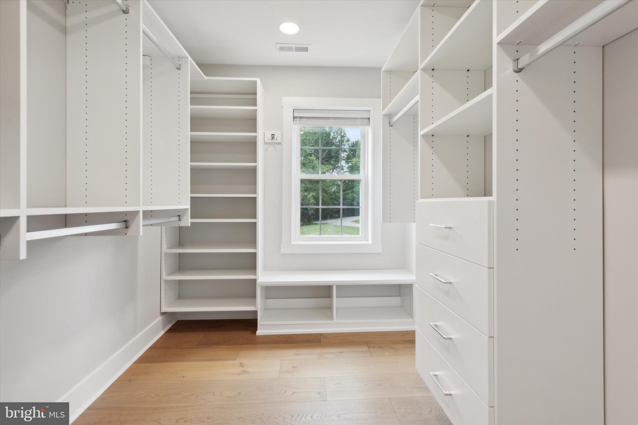 607 Golf Club Road Newtown Square, PA 19073 - Photo 53 of 86 a view of walk in closet with empty racks