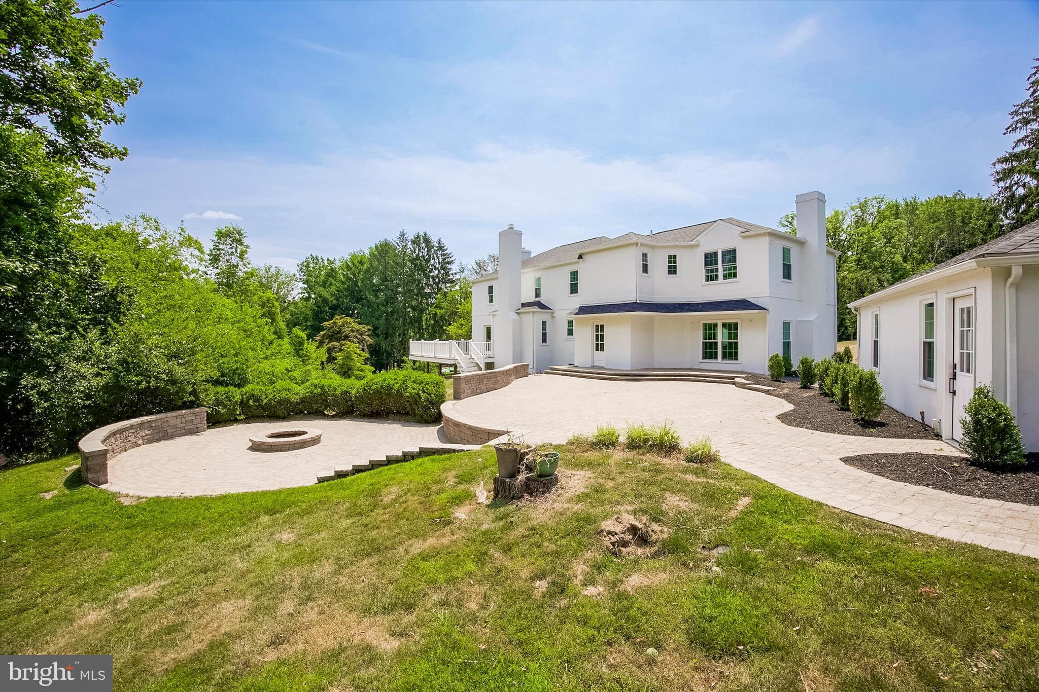607 Golf Club Road Newtown Square, PA 19073 - Photo 73 of 86 a front view of a house with a yard