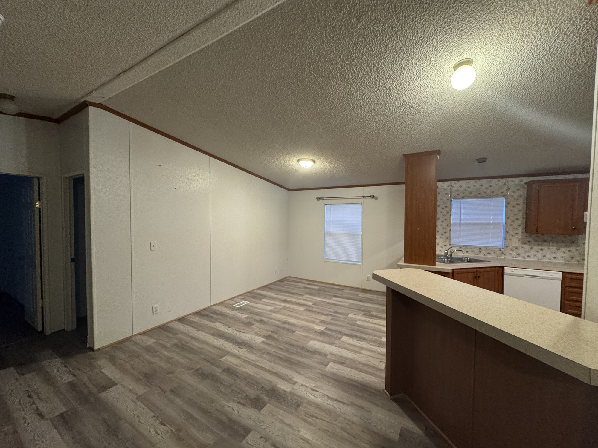 70 Timber Road Point Blank, TX 77364 - Photo 19 of 20 a view of a kitchen with a sink and a refrigerator