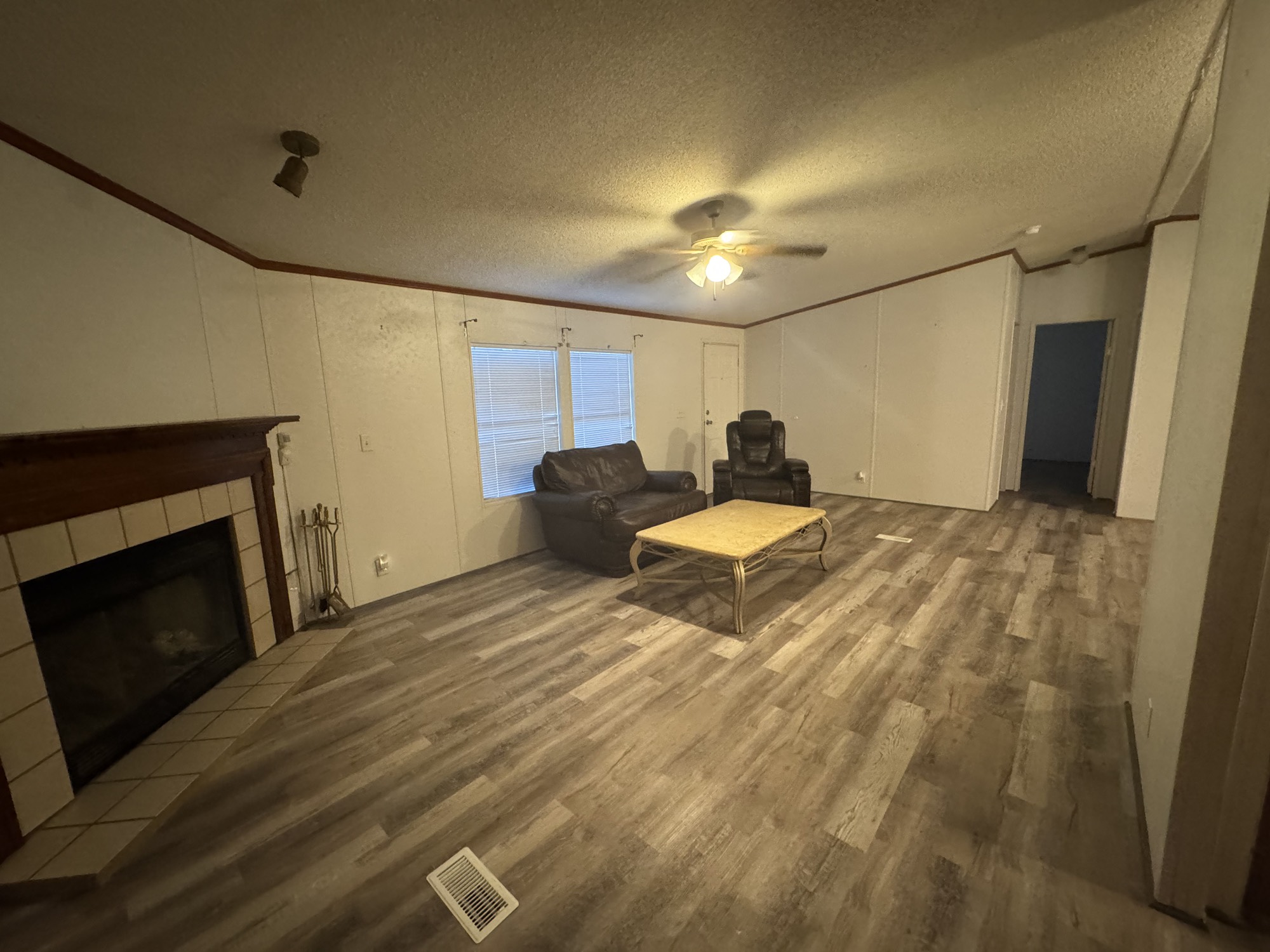 70 Timber Road Point Blank, TX 77364 - Photo 6 of 20 a bedroom with a bed and a fireplace