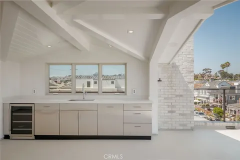 a bathroom with a sink a vanity and a bathtub