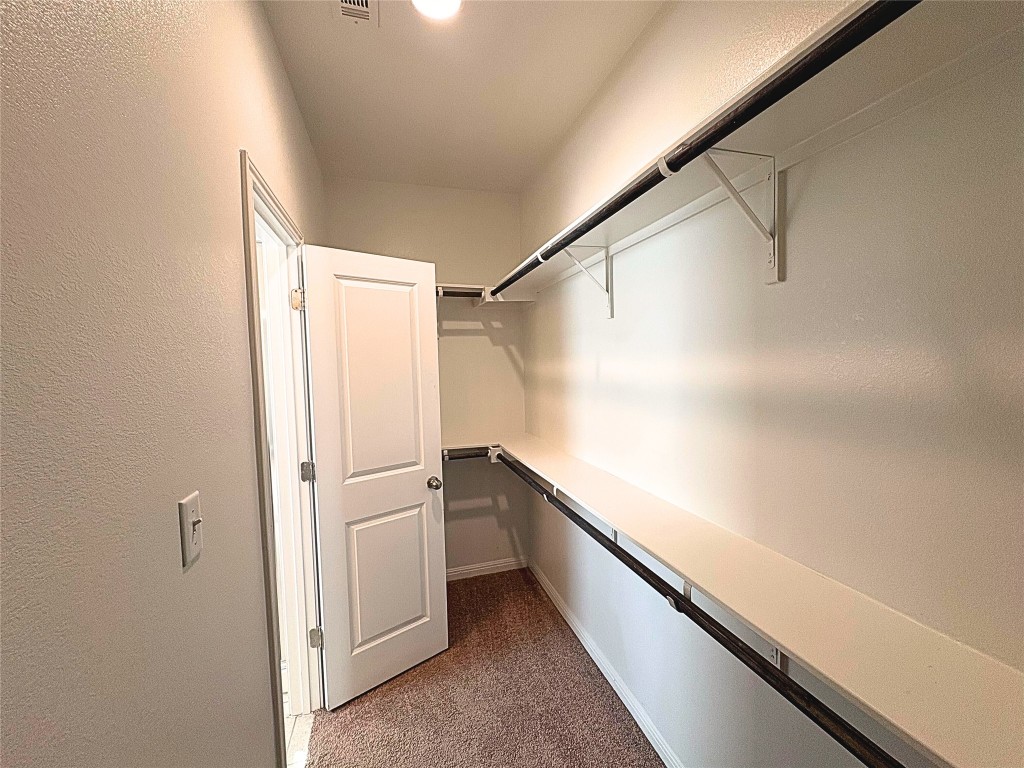 240 Arabian Colt Drive Georgetown, TX 78626 - Photo 13 of 25 a view of closet and utility room