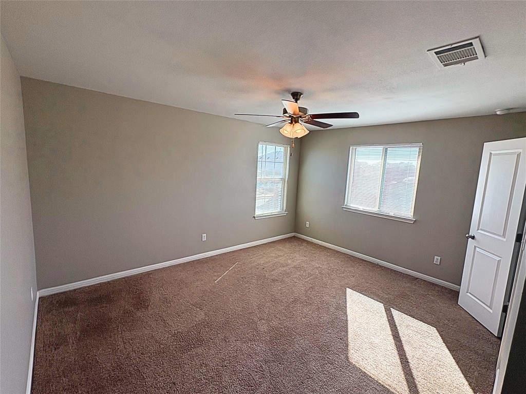 240 Arabian Colt Drive Georgetown, TX 78626 - Photo 20 of 25 a view of an empty room with a window