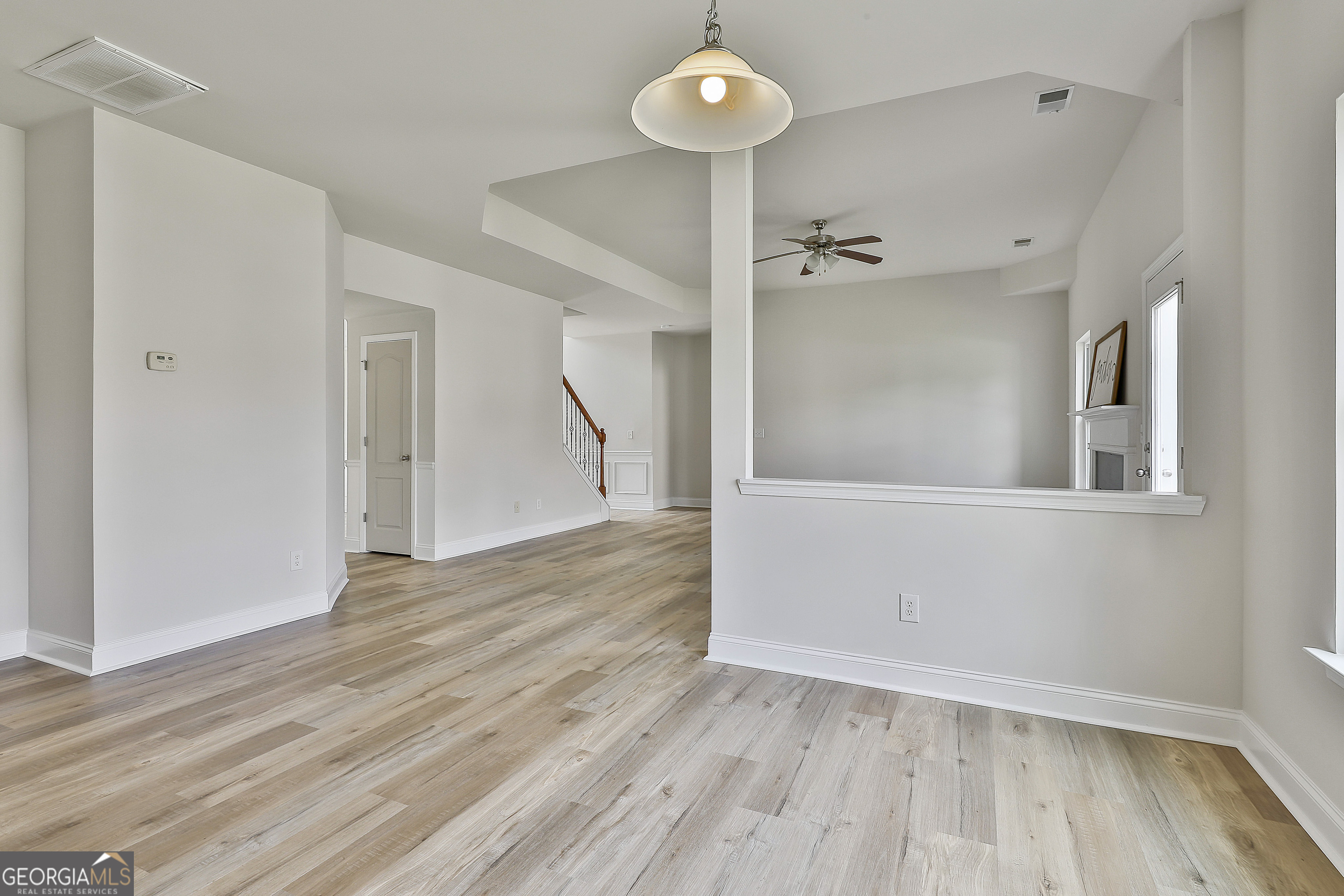28 Fox Ridge Drive Newnan, GA 30265 - Photo 21 of 48 an empty room with wooden floor and windows