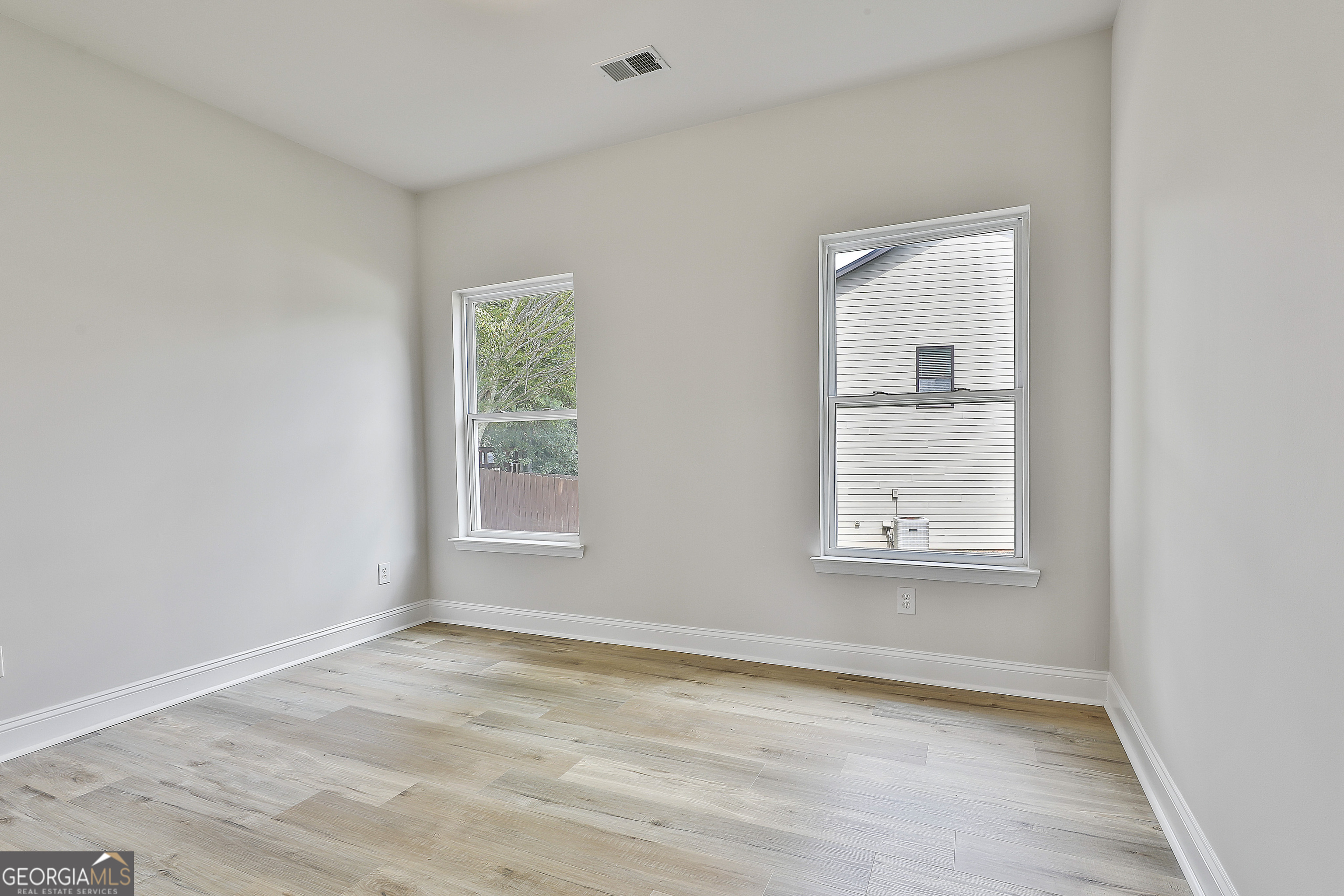 28 Fox Ridge Drive Newnan, GA 30265 - Photo 22 of 48 an empty room with a window