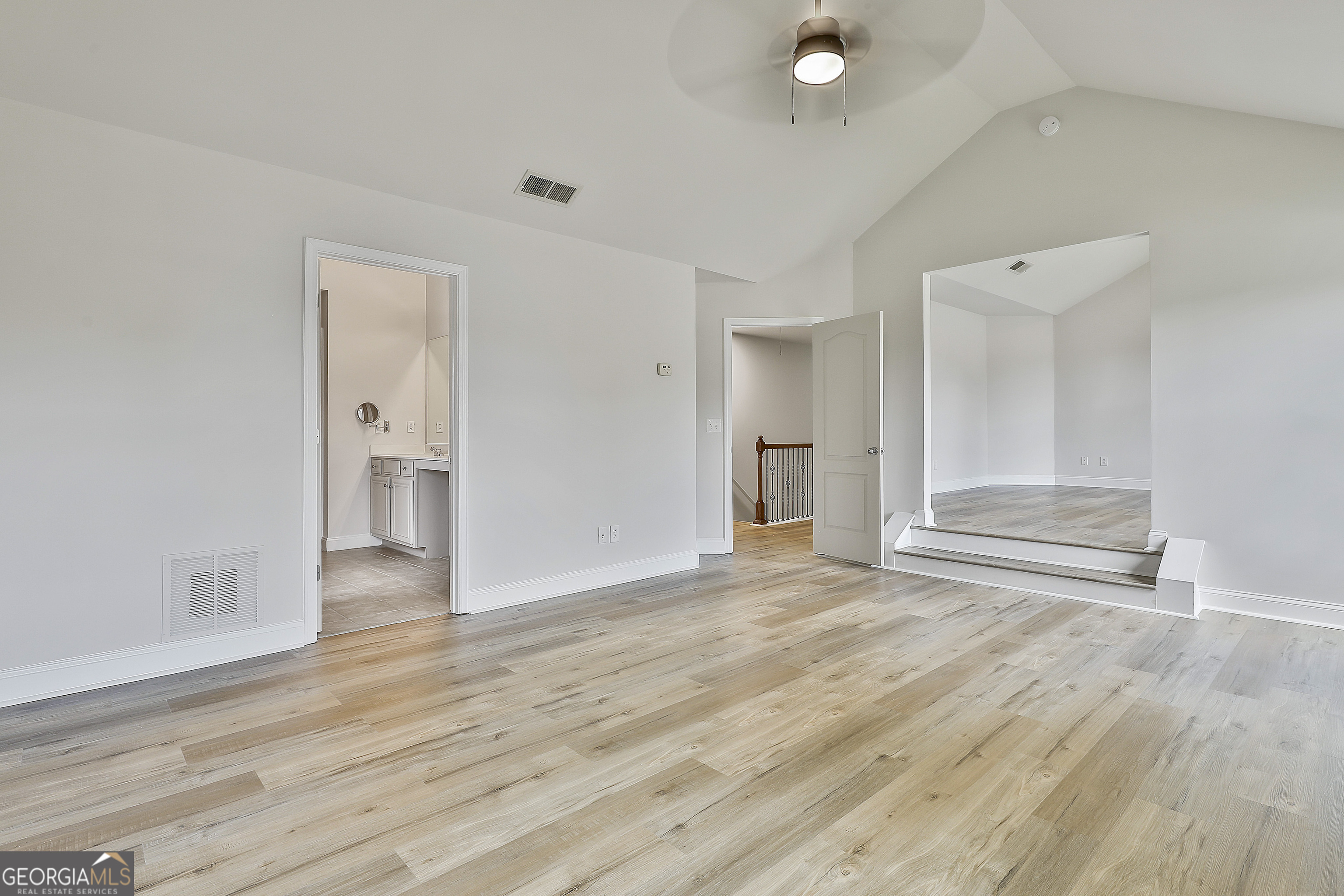 28 Fox Ridge Drive Newnan, GA 30265 - Photo 26 of 48 a view of empty room with wooden floor and entryway
