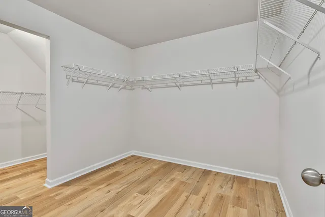 a view of a room with racks on the wall