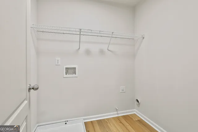 a view of a room with racks on the wall