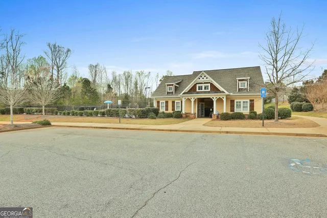 a front view of a house with a ocean view