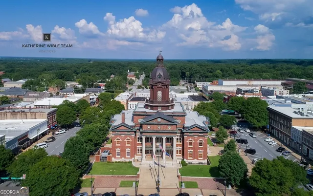 a view of a lake with a city in the background