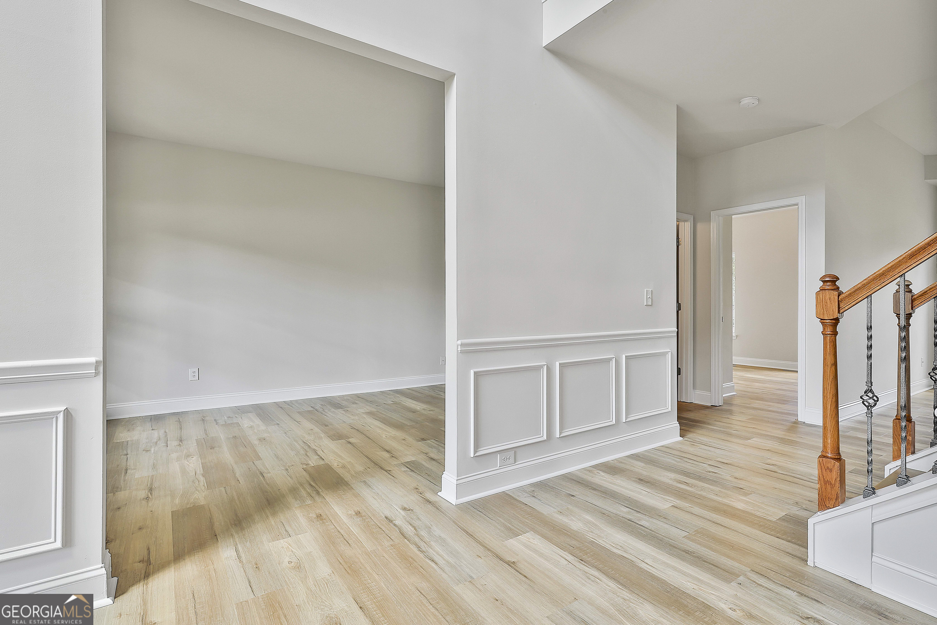 28 Fox Ridge Drive Newnan, GA 30265 - Photo 10 of 48 a view of an empty room with wooden floor