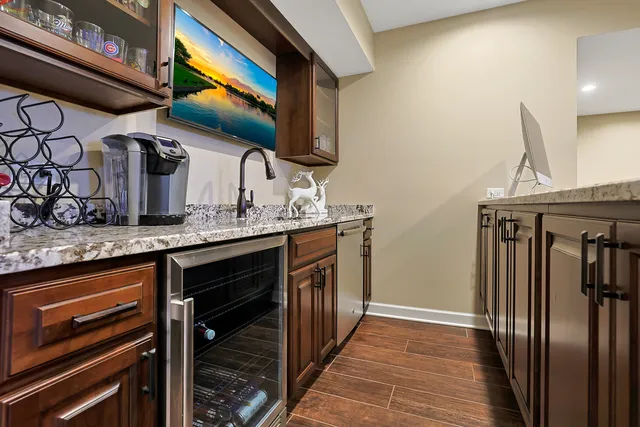 a kitchen with stainless steel appliances granite countertop a stove and a sink