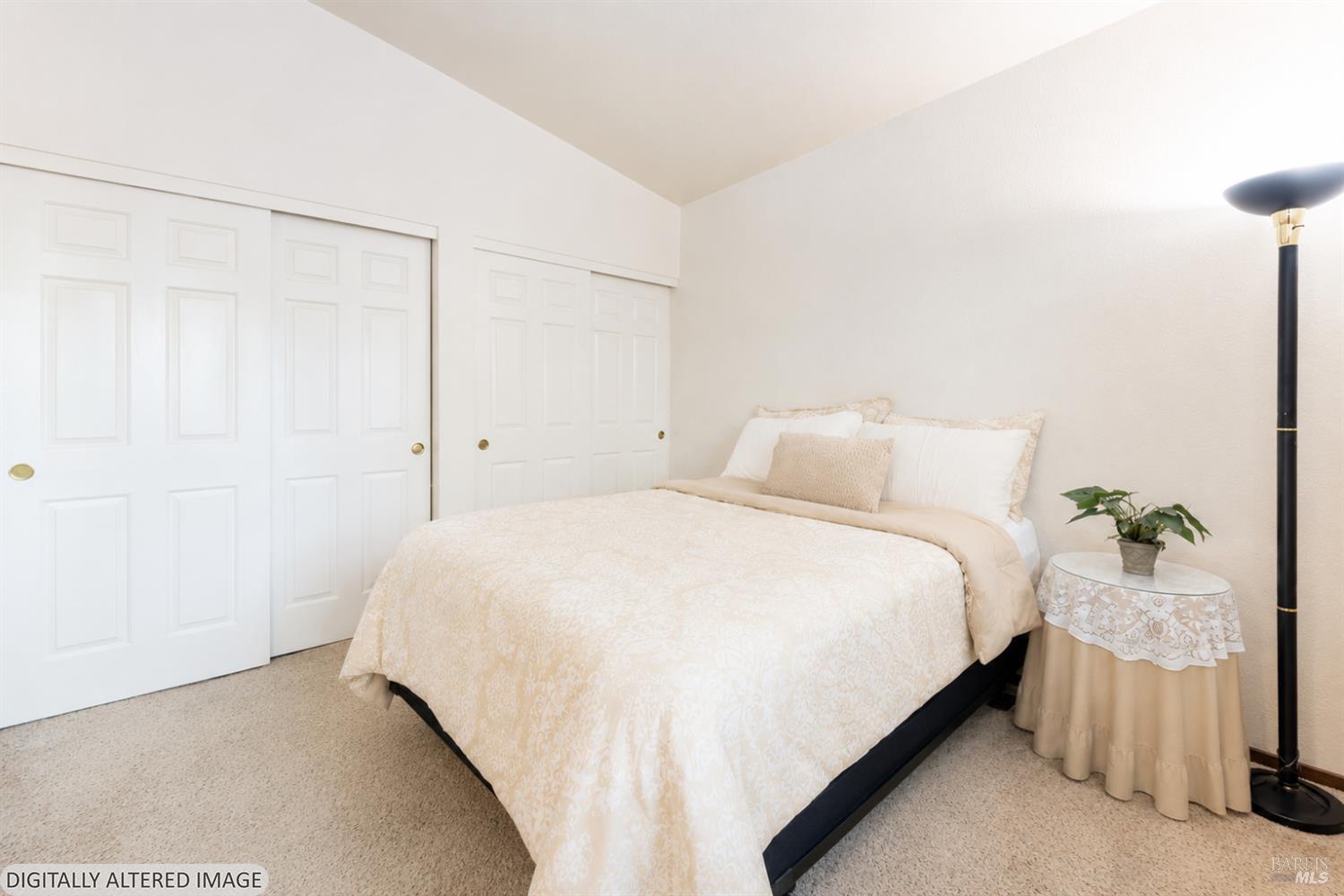 1935 Seville Street Santa Rosa, CA 95403 - Photo 10 of 30 a bedroom with a bed and a table