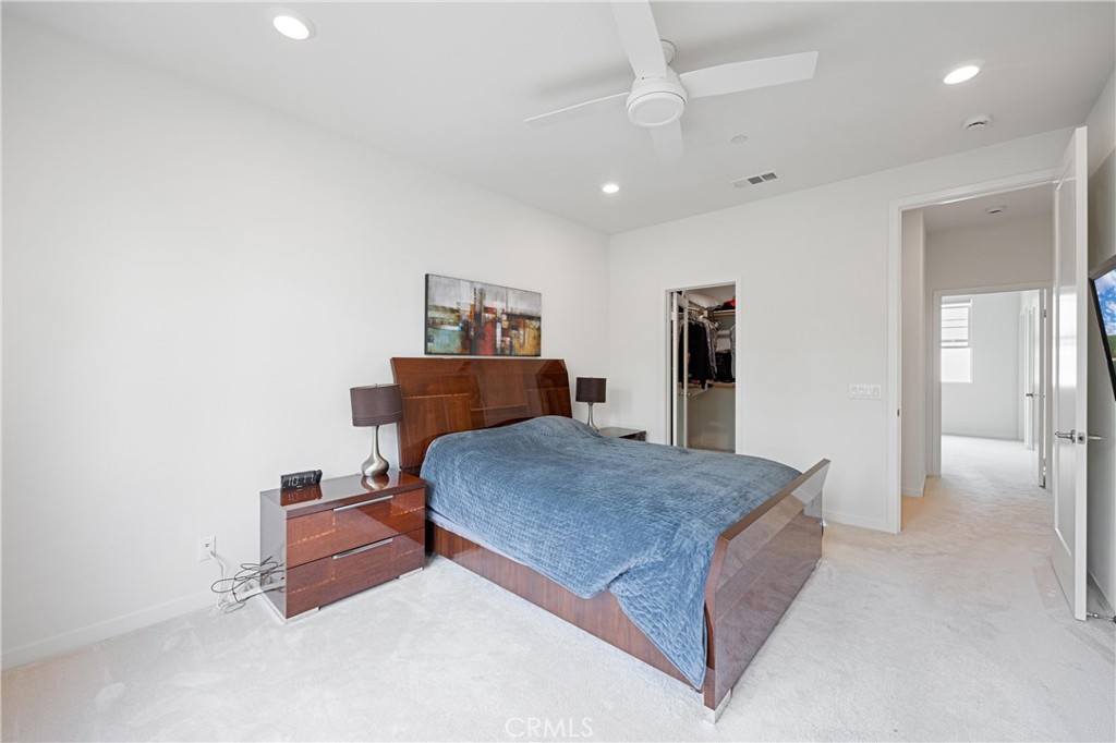 138 Acamar Irvine, CA 92618 - Photo 13 of 35 a bedroom with a bed and dresser