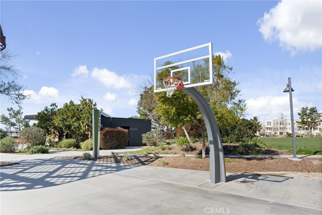 138 Acamar Irvine, CA 92618 - Photo 29 of 35 a front view of a house with a yard and garage