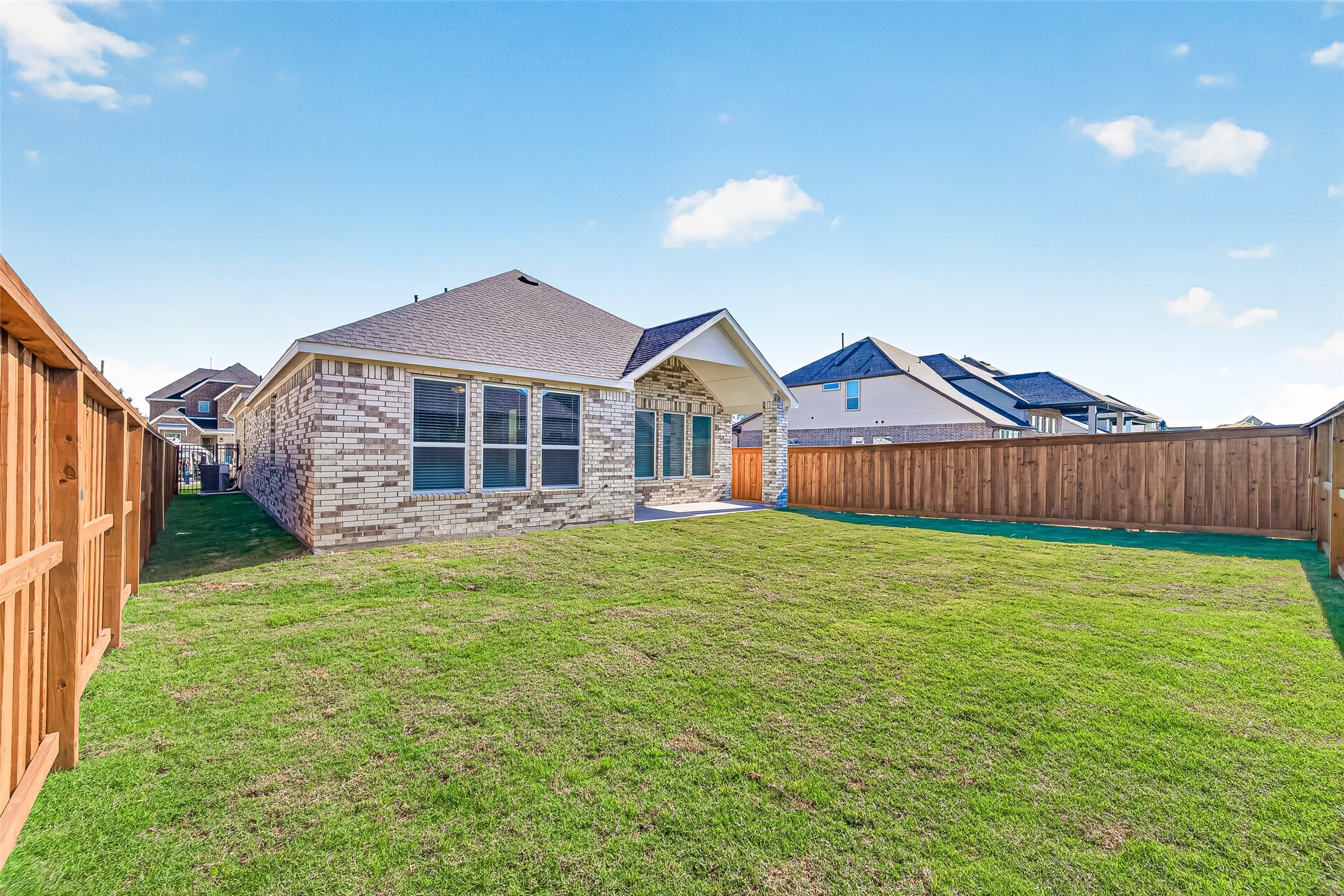4916 Northern Wds Drive Spring, TX 77386 - Photo 42 of 44 a view of a house with a yard and deck