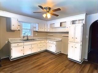 597 Mount Nebo Church Road Alverton, PA 15612 - Photo 5 of 19 a kitchen with stainless steel appliances white cabinets and wooden floors