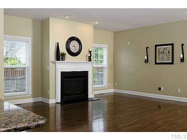 10624 Longholme Way Raleigh, NC 27614 - Photo 6 of 12 This gracious family room with hardwood floors is the perfect place to relax. Also enjoy the GAS LOG fireplace.