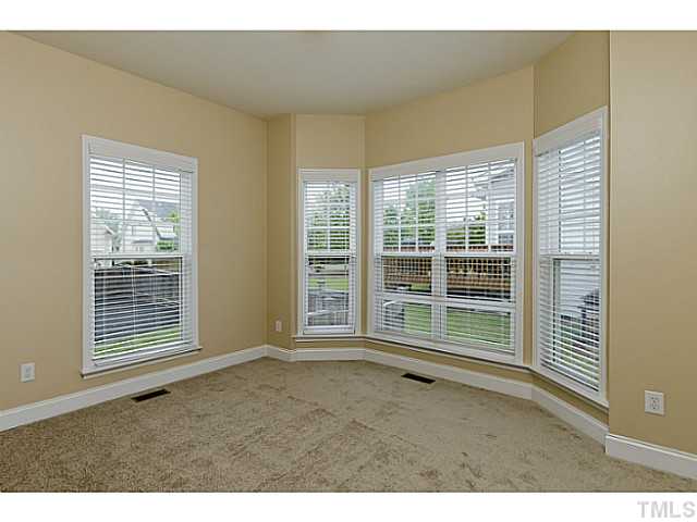 10624 Longholme Way Raleigh, NC 27614 - Photo 7 of 12 A VERSATILE room on the main floor could be a home office, playroom, guest room, or library.