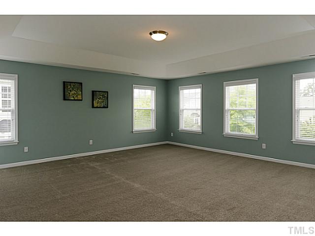 10624 Longholme Way Raleigh, NC 27614 - Photo 8 of 12 Enjoy this GORGEOUS, over-sized master suite with NEW CARPET, tray ceiling and lots of windows for plenty of light.