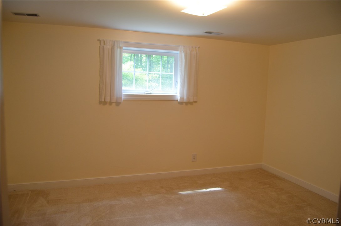 5400 Tall Pine Road Midlothian, VA 23112 - Photo 19 of 22 an empty room with a window