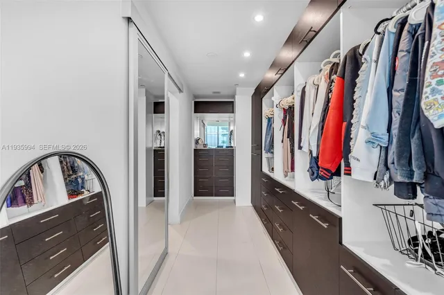 a bathroom with a toilet sink and shower