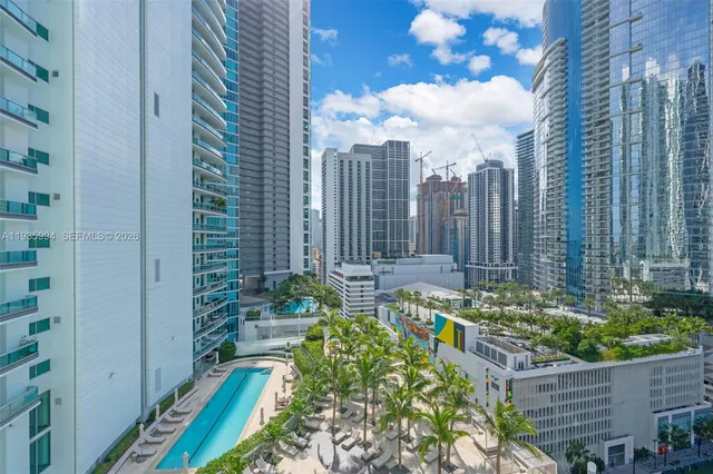 a view of a city with tall buildings